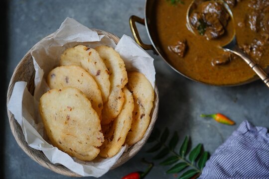 Ney Patha or Pathiri - Kerala Malabar breakfast served with Lamb curry