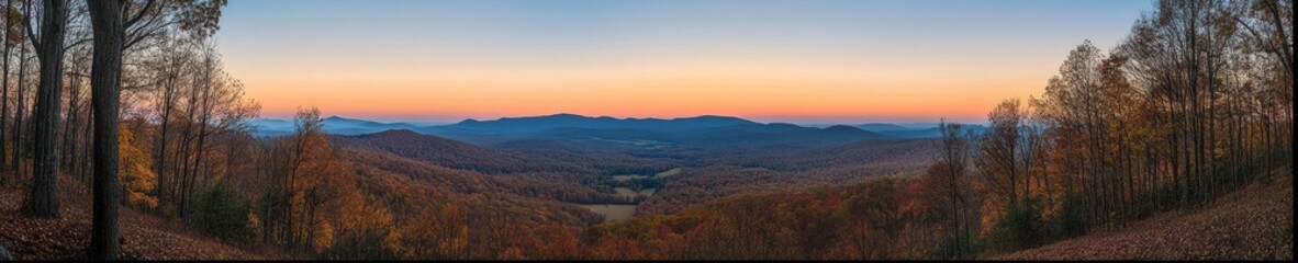 Fototapeta premium Vibrant Autumn Sunset Over Rolling Hills With Trees and Valleys in a Serene Landscape During the Evening Hours