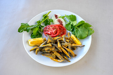 Fried Anchovies (Turkish Name: Hamsi Tava) .Hamsi, istavrit, sardalya tava. Balik kizartma. Izgara cipura levrek, palamut  yesil salata.