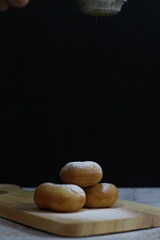 Three Delicious Doughnuts Ready to be Enjoyed