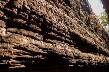 The Naga Cave in Bueng Kan, Thailand, features serpent-like rock formations tied to Naga mythology, attracting visitors to Phu Langka National Park for nature and spirituality