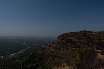 The Naga Cave in Bueng Kan, Thailand, features serpent-like rock formations tied to Naga mythology, attracting visitors to Phu Langka National Park for nature and spirituality