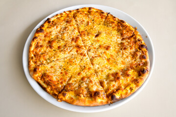 Traditional Turkish cuisine. Pizza, pita, pidesi, sucuk, hummus, kebab. Many dishes on the table. Serving dishes in restaurant. Margherita,  mix, formaggi, veggie karisik pizza. Top view, flat lay