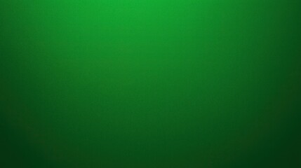 Fototapeta premium top view on solid green color paper sheet flat surface, texture background 