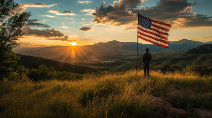 Honoring heroes at sunset with a flag on Memorial Day in the mountains. 