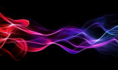 Obraz premium Abstract waves of colorful light against a dark background.