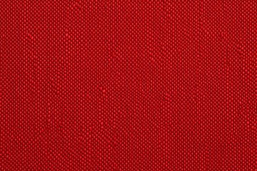 Detailed examination of vibrant red textile material.