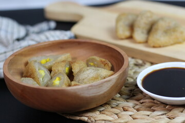 Delicious Pempek with savory sauce