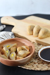 Delicious Pempek with Sweet and Savory Sauce