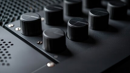 Musical equalizer controls and detailed close-up of a black sound amplifier interface