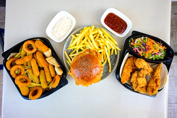 Homemade fried chicken nuggets isolated on white background. Chicken nugget. Citir tavuk. Citir, tavuk atistirma  tabagi.