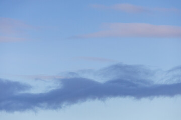 Naklejka premium Serene Sky with Soft Clouds During Sunset Over BC, Canada