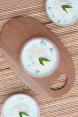 Refreshing Pandan Layer Dessert with Cheese and Pandan Leaves