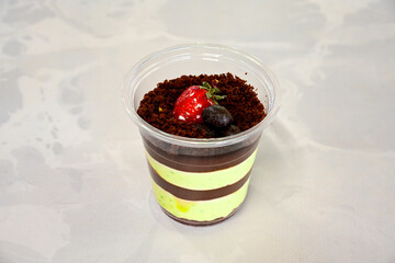 Close-up of homemade mug cakes with protein topping. Tek kisilik, adet yas pasta. Red velvet, Profiterol, meyveli, krokanli, frambuazli,  cikolatali yas pasta. Dogum gunu pastasi. Cilekli, frambuazli.