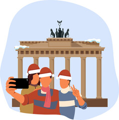 Friends take selfies near theBrandenburg Gate   on Christmas. © Svutlana