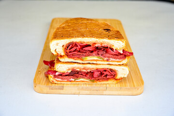 Turkish karisik atom kare  tost ( kasarli bazlama tost) . Sucuklu, Kasarli,  cheddarli, kavurmali karisik tost. Flat baked bread toasted. Karisik bazlama tost .
