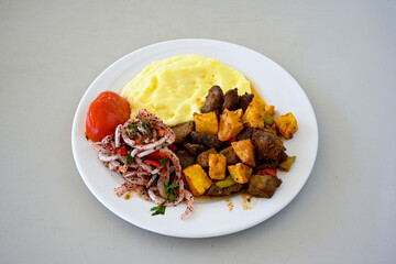 Famous Urfa meat liver, ciger wrapped by lavash with roasted chili pepper, onion and sauce in...