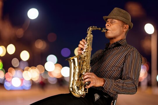 Happy jazz music band performing during live concert - Powered by Adobe