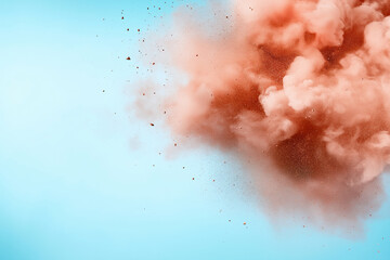 Fototapeta premium Colorful powder explosion creates vibrant clouds against blue backdrop during celebration
