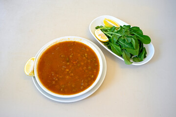 Bamya, Turkish traditional food. (Turkish cuisine) Homemade Food Okra in Plate. Organic Food. Etli bamya yemegi. 