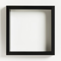 Black Frame: A close-up studio shot captures the elegant simplicity of a square, black picture frame, poised on a wall.