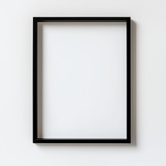 Fototapeta premium Modern Frame Showcase: A sleek, black picture frame hangs elegantly against a plain background, offering a perfect display for art or photography.