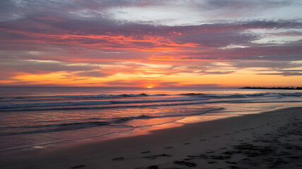 Obraz premium A photo of a beautiful sunset at the beach.