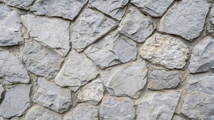 Obraz premium Stone tiles arranged in a geometric pattern, displaying uniformity and precision while retaining the natural irregularities of rock textures. Background