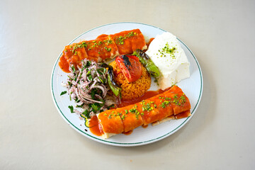 Famous Urfa meat liver, ciger wrapped by lavash with roasted chili pepper, onion and sauce in Sanliurfa, Turkey. Kuzu et ciger sis. Izgara dana bonfile, cop sis, kuzu pirzola. Karisik kebap, beyti keb