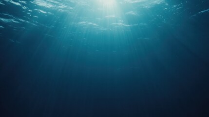 Ethereal Underwater Scene with Sun Rays Illuminating Deep Blue Ocean Water