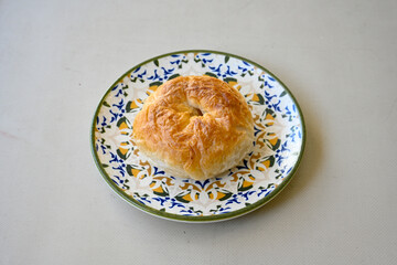 Turkish pastry product , tasty pogaca. Simit, gevrek. Turkish Pastries; peynirli, patatesli, kasarli pogaca, borek, acma, ay coregi at patisserie showcase. Boyoz peynirli acar. 