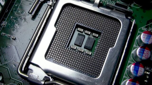 A fragment of a motherboard with an empty processor socket