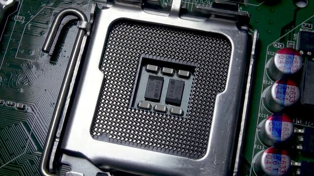 A fragment of a motherboard with an empty processor socket