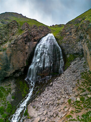 Beautiful view of a waterfall in the North Caucasus mountains. Landscape and nature of the North...