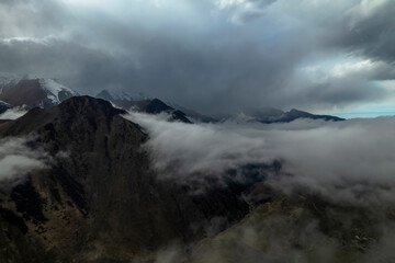Obraz premium Mountains in the clouds. Low clouds in the North Caucasus mountains