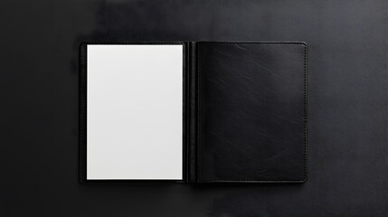Black Leather Notebook Open Displaying Blank Page
