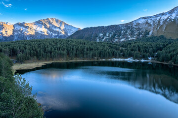 Beautiful aerial view of a mountain lake in a picturesque gorge. Landscape and nature of the North Caucasus