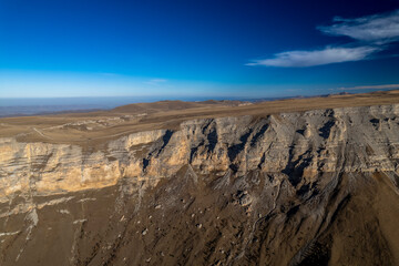 Beautiful aerial view of a mountain range with high cliffs. Landscape and nature of the North Caucasus
