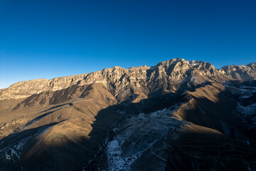 Beautiful aerial view of a mountain range with high cliffs. Landscape and nature of the North Caucasus