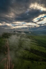 Mountains in the clouds, low clouds in a mountain valley. Landscape and nature of the North Caucasus