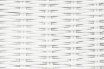 White wicker basket pattern. Bright plastic weave design. Intricate craftsmanship and geometric weave texture. Grid pattern. Mesh background.