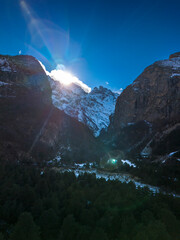 Beautiful aerial view of snowy peaks in a picturesque gorge. Landscape and nature of the North Caucasus