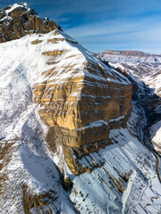 Beautiful aerial view of a mountain range with high cliffs. Landscape and nature of the North Caucasus