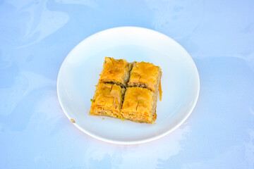 Turkish Dessert Sobiyet, havuc dilimi, midye baklava, mussels baklava and classic baklava with Pistachio . Cikolatali cevizli, fistikli soguk Baklava, top view.