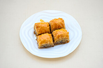 Turkish Dessert Sobiyet, havuc dilimi, midye baklava, mussels baklava and classic baklava with Pistachio . Cikolatali cevizli, fistikli soguk Baklava, top view.