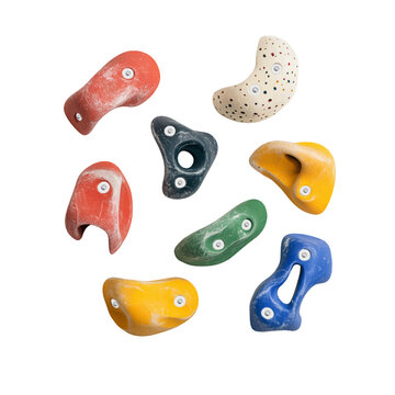 Set of grips different colors and shapes for climbing wall isolated on white background. set collection of various artificial climbing holds. bouldering extreme sport	
