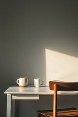 Warm morning light illuminates a simple table with a cup and lamp in a cozy room