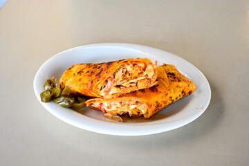 Lavash zurna doner kebab ( zurna  durum )  or shawarma sliced in plate isolated.  hatay usulu tavuk...