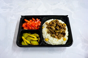Famous Urfa meat liver, ciger wrapped by lavash with roasted chili pepper, onion and sauce in Sanliurfa, Turkey. Kuzu et ciger sis. Izgara dana bonfile, cop sis, kuzu pirzola. Karisik kebap, beyti keb