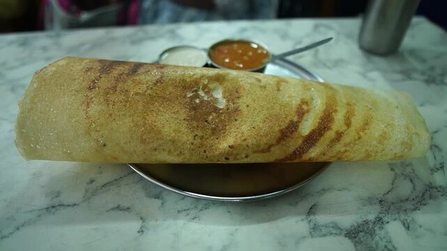 Masala dosa with sambar and chutney prepared in North Indian style